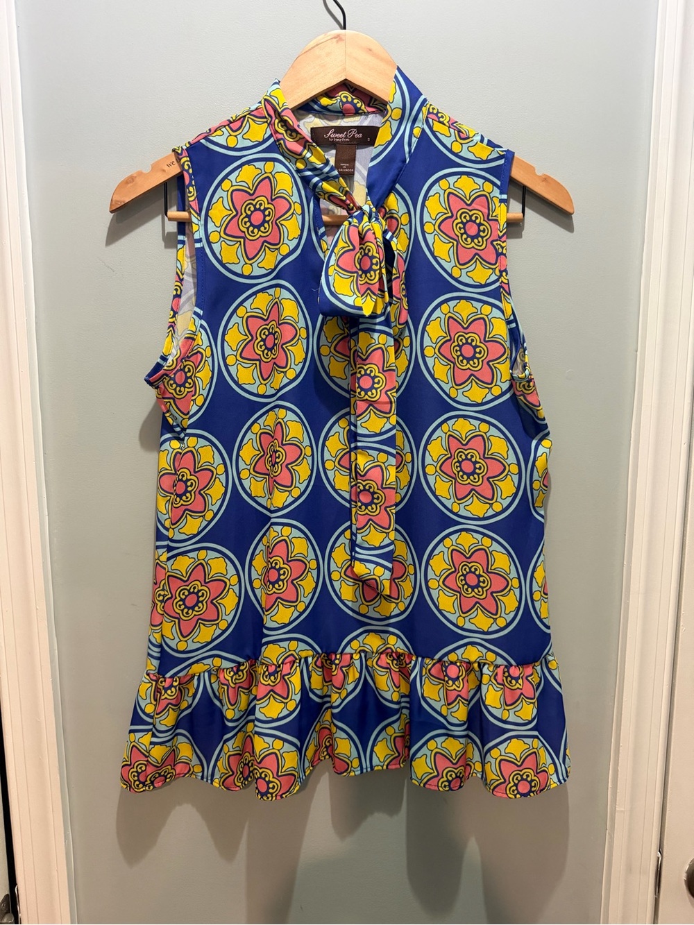 Sweet Pea Blue Floral Tie-Neck Ruffle Hem Sleeveless Top